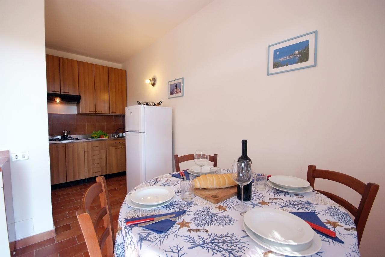 Residence Sud Est Porto Azzurro Extérieur photo