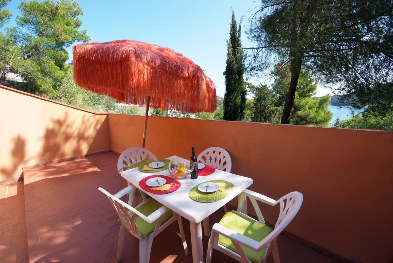 Residence Sud Est Porto Azzurro Extérieur photo