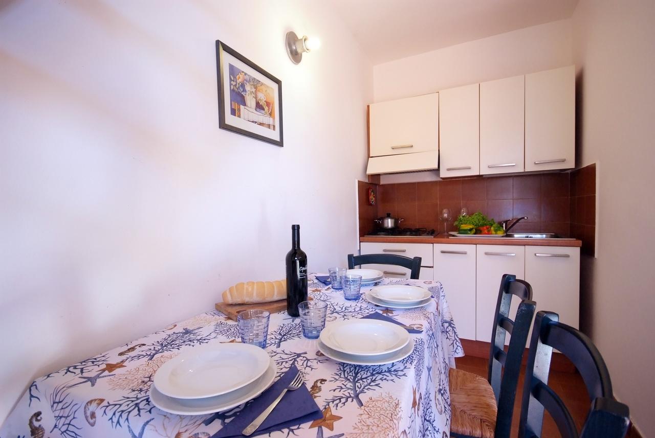 Residence Sud Est Porto Azzurro Extérieur photo